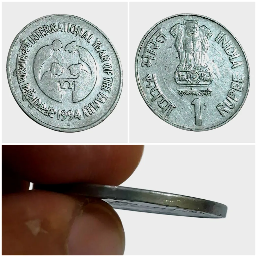 One Rupee Fss COMMEMORATIVE Issue INTERNATIONAL YEAR OF FAMILY Year 1994 NOIDA Mint Plain Edge & Ghosting Error **RARE** High Collectable Grade.
