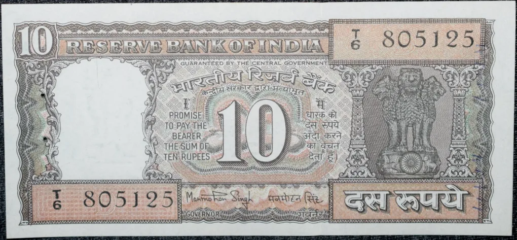 10 Rupees of Republic India (AD 1984-1985) Manmohan Singh Signature Black note with Boat About UNC Grade