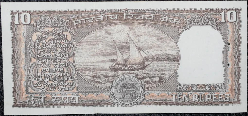 10 Rupees of Republic India (AD 1984-1985) Manmohan Singh Signature Black note with Boat About UNC Grade