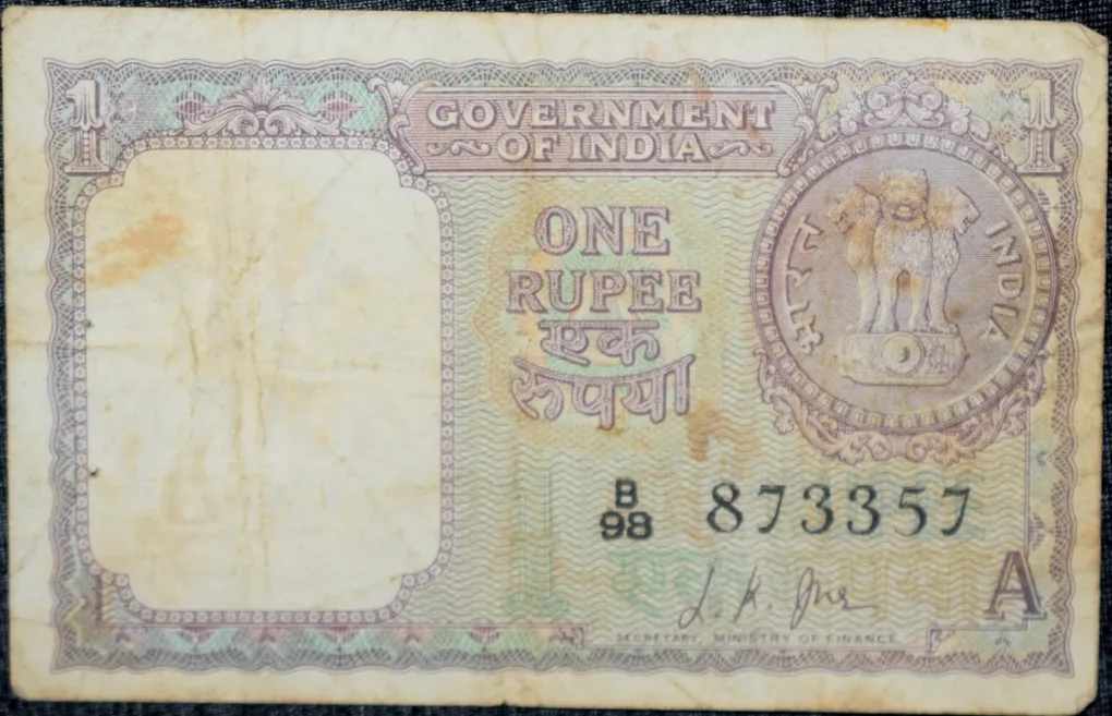 1 Rupee of Republic India (AD 1963) L.K. Jha - Violet color. Smaller watermark window and numbers to the left. Large ornamental 1 in the centre