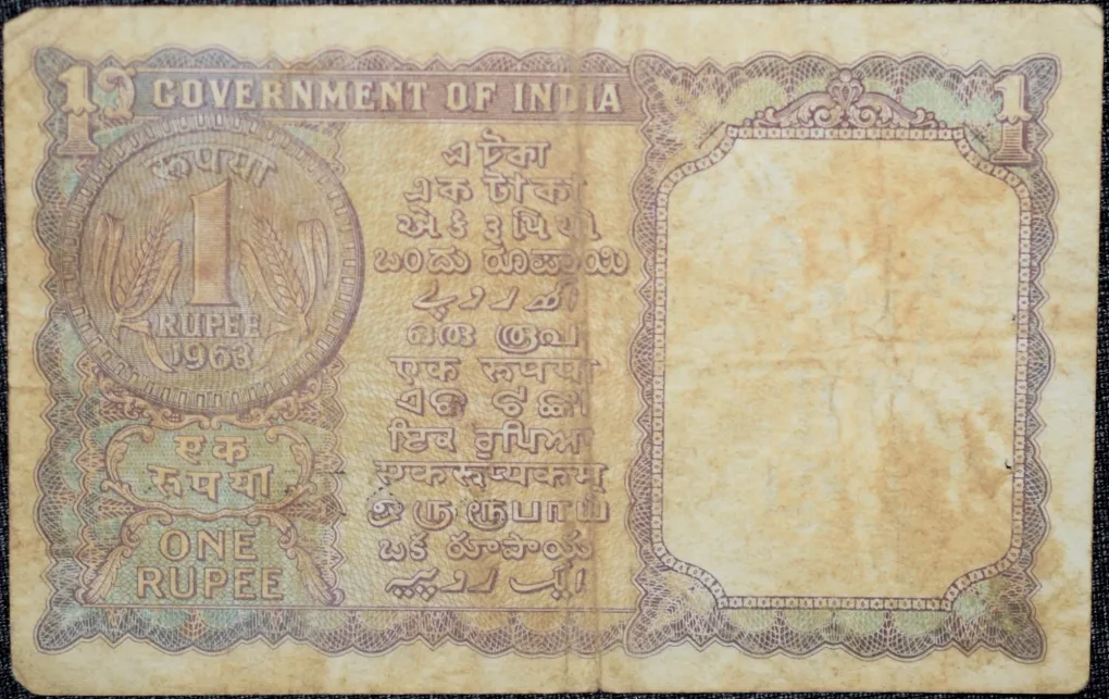 1 Rupee of Republic India (AD 1963) L.K. Jha - Violet color. Smaller watermark window and numbers to the left. Large ornamental 1 in the centre