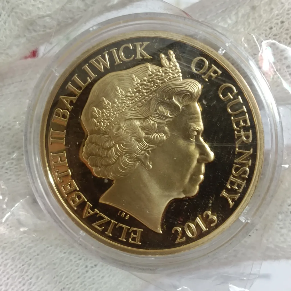 2013 Queen Elizabeth II 60th Anniversary of the Coronation (1953–2013) Commemorative Proof Coin often styled as a 50 pence or crown-size commemorative Proof Coin issue from British Crown dependencies Guernsey