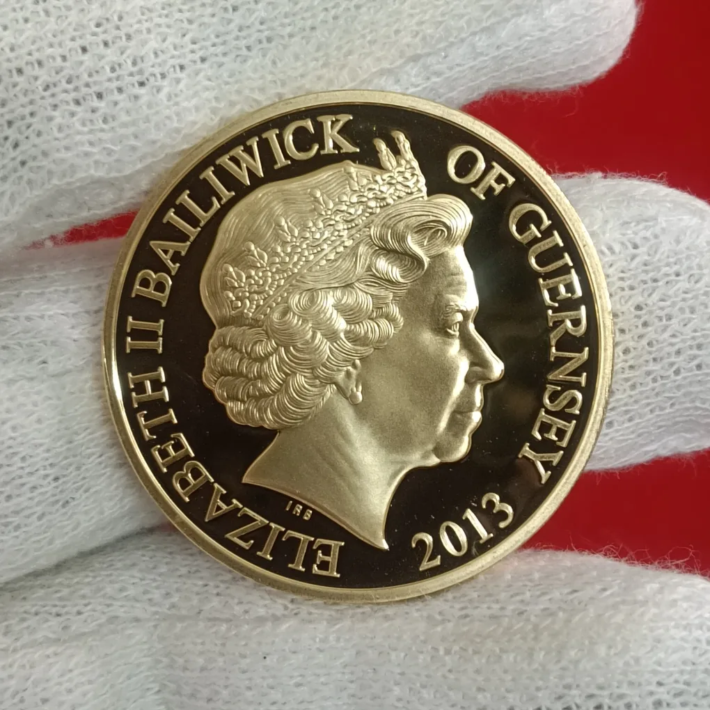 2013 Queen Elizabeth II 60th Anniversary of the Coronation (1953–2013) Commemorative Proof Coin often styled as a 50 pence or crown-size commemorative Proof Coin issue from British Crown dependencies Guernsey