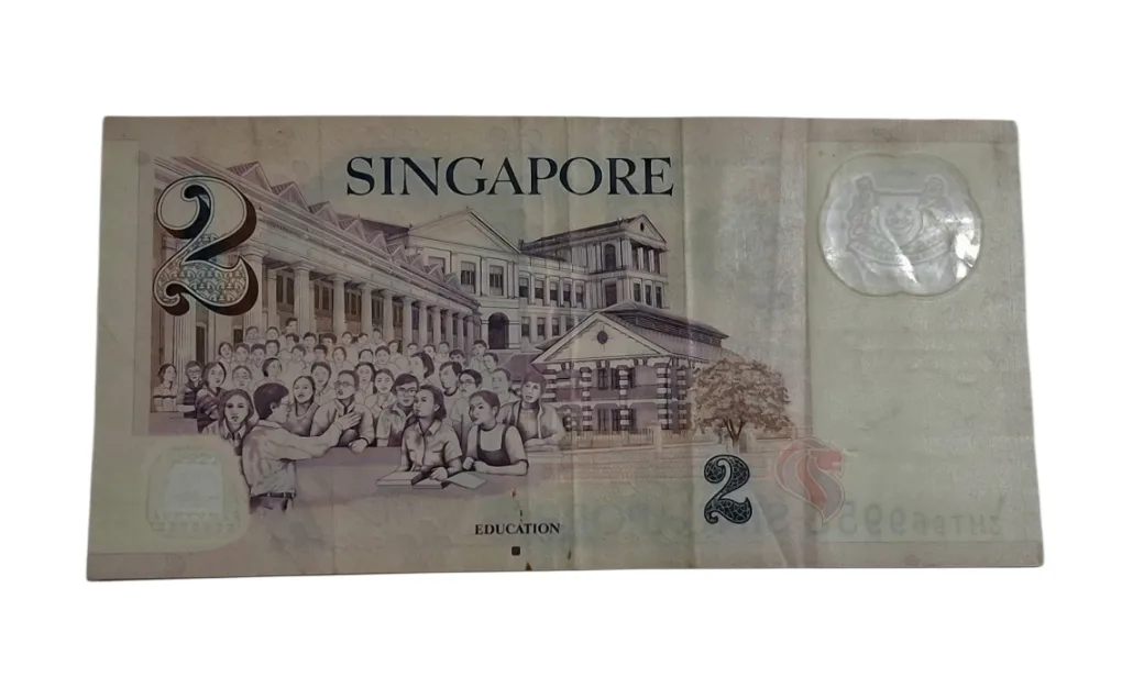 SINGAPORE 2 DOLLARS Educational Theme POLYMER Issue Bank Note in Collectable Grade.