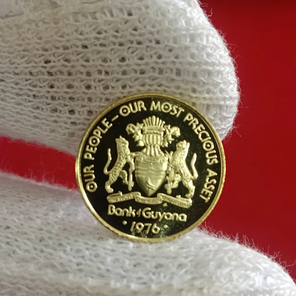 Rare One Cent 1976 Year Proof Coin issued by the Bank of Guyana the national coat of arms and the motto "OUR PEOPLE-OUR MOST PRECIOUS ASSET F17