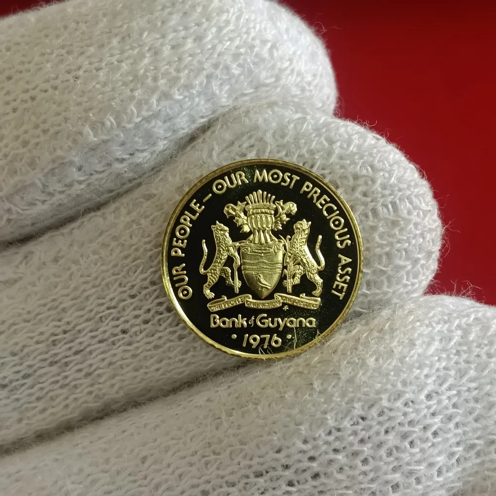 Rare One Cent 1976 Year Proof Coin issued by the Bank of Guyana the national coat of arms and the motto "OUR PEOPLE-OUR MOST PRECIOUS ASSET F17