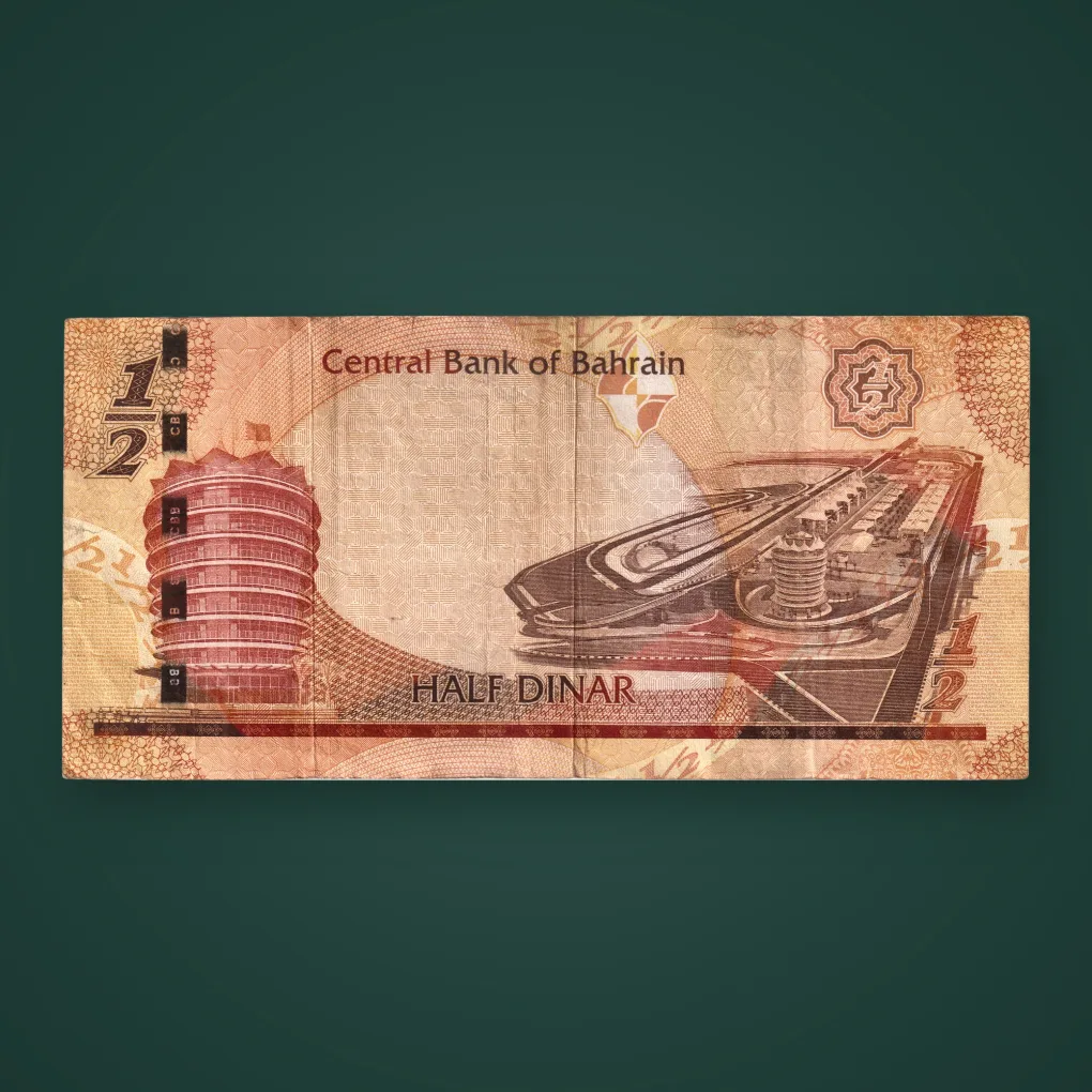 Rare 1/2 Dinar 2006 Central Bank of Bahrain Law 64/2006 Bahrain International Circuit World Note # A982