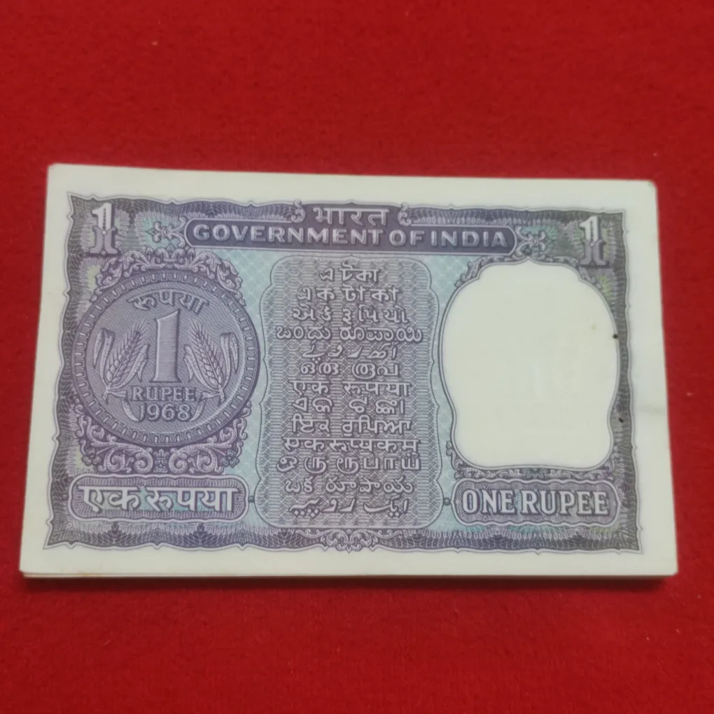 ONE RUPEE PACKET A-19 -STARTING 62,62 NUMBER -FINANCE SECRETARY I. G. PATEL -ISSUE DATE 1968 -LOOSE CHOCOLATE CONDITION PACKET -SERIAL NUMBER ENDING 703 TO 799 WITHOUT 786 NUMBER -5 NOTE SERIAL PRICE